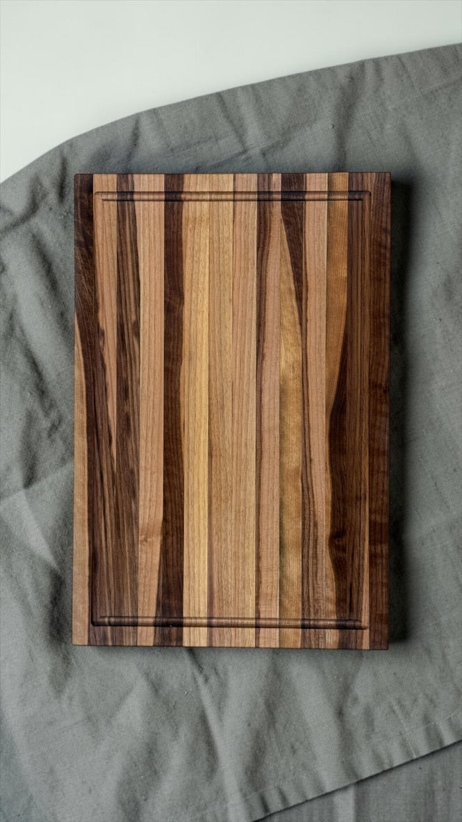 Black American walnut utility board with juice groove