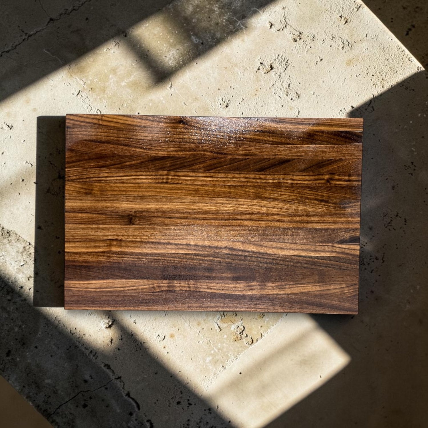Small black walnut gift board overhead product photo